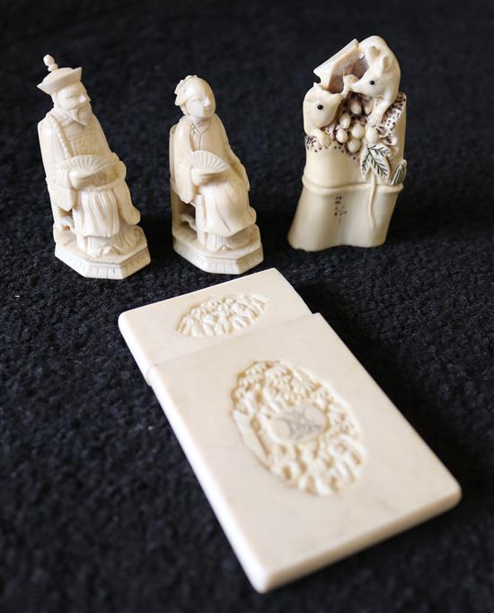 A Chinese ivory card case and two figures and a hippo tooth carving